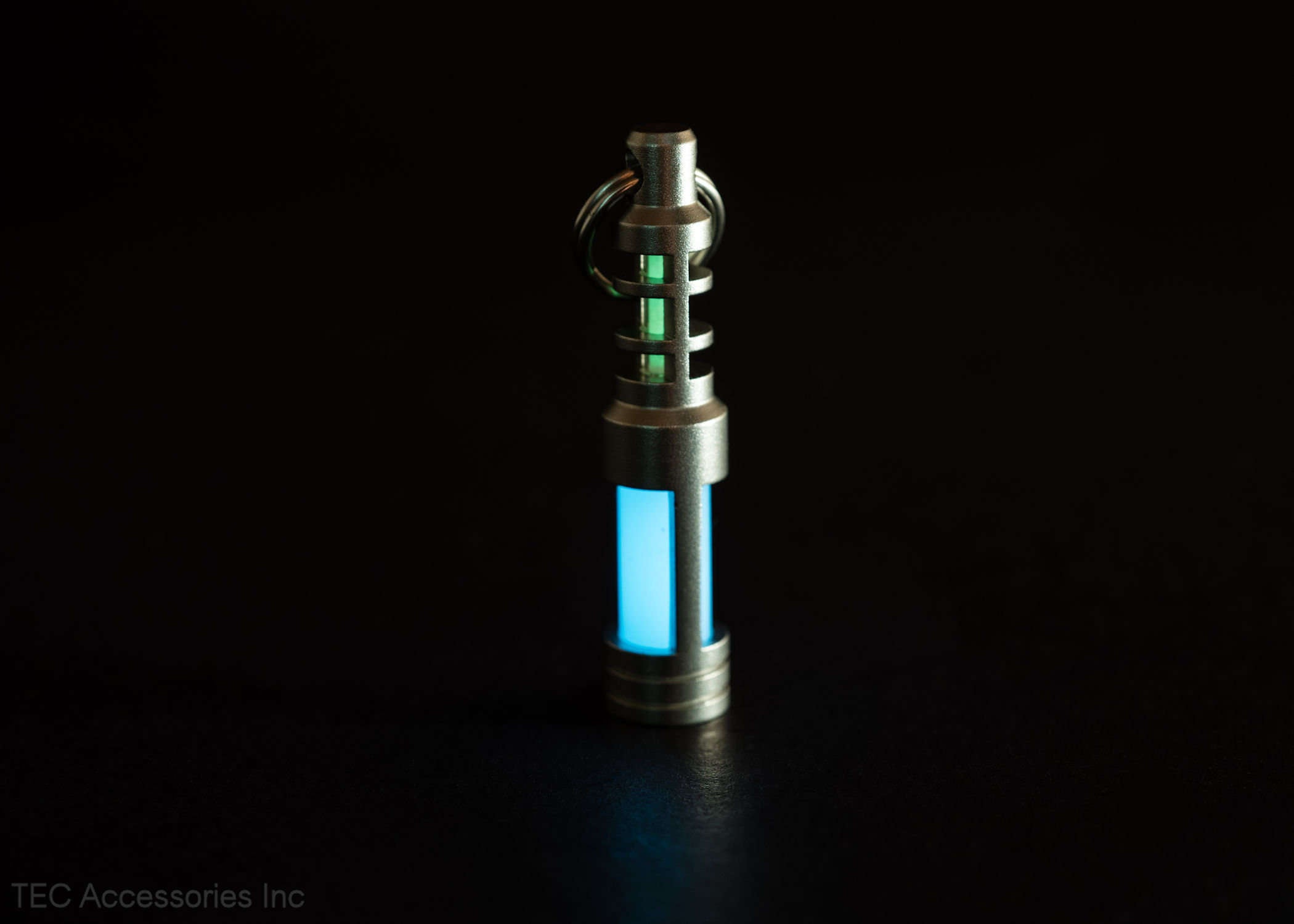 Tec-scr Isotope Chain Reaction Fob Aqua Glow Tec-scr Isotope Chain Reaction Fob Aqua Glow